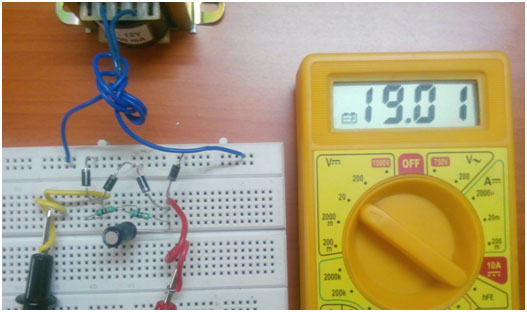 Full wave rectifier circuit on breadboard with filter 4